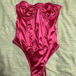 pink body suit